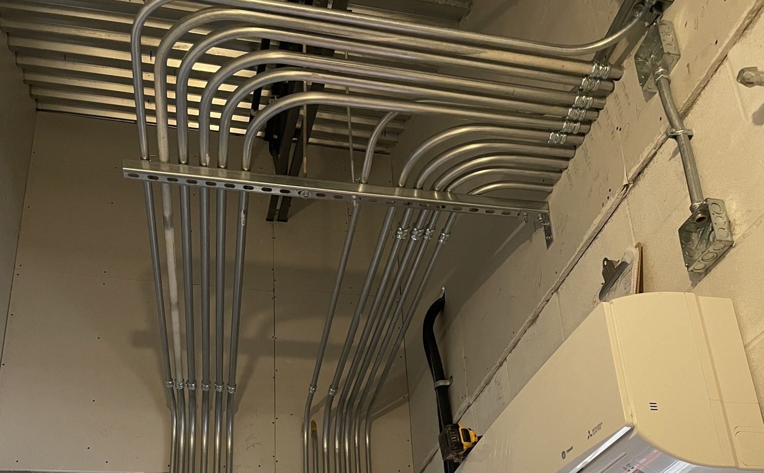 Conduit and panel work on a job